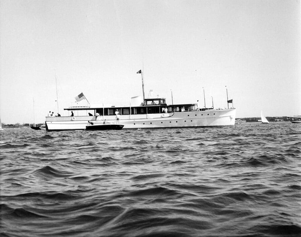 John F. Kennedy and his presidential yacht Honey Fitz in Nantucket Harbor in 1963. photo courtesy NHA