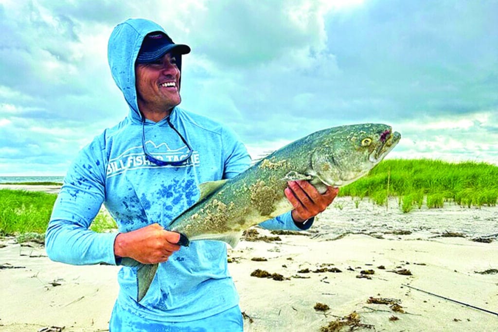 Tedy holding a fish