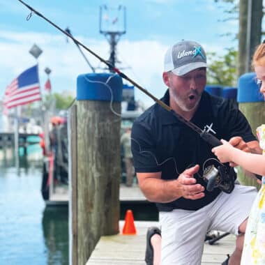 Children learning to fish at Nantucket Anglers Club event