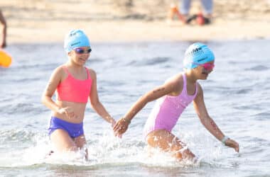 Swimmers at Jetties Beach participate in the Swim Across America Nantucket charity open water swim raising funds for cancer care and research.