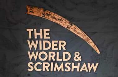 The Nantucket Whaling Museum's Wider World & Scrimshaw exhibit title wall features an engraved Arctic tusk.