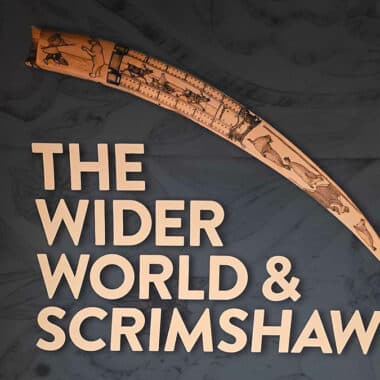 The Nantucket Whaling Museum's Wider World & Scrimshaw exhibit title wall features an engraved Arctic tusk.